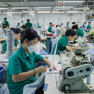 Workers in Kg garment manufacturing factory